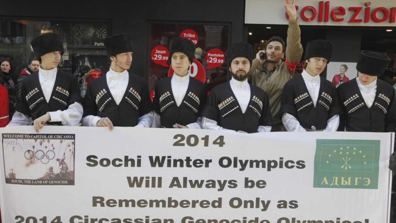 Circassians living in Turkey gather in front of the Russian Consulate to protest against the 2014 Sochi Winter Olympics in Istanbul February 2, 2014. REUTERS/Osman Orsal (TURKEY - Tags: POLITICS CIVIL UNREST SPORT) - RTX184ZD