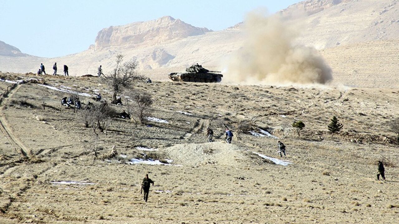 Forces loyal to Syria's President Bashar al-Assad are seen in the Qalamoun mountains north of Damascus, in this handout photograph distributed by Syria's national news agency SANA on December 27, 2013. Syria's army ambushed Islamist fighters in the Qalamoun mountains north of the capital Damascus on Friday, leaving as many as 60 people dead, the Syrian Observatory for Human Rights said. The attack happened between the Christian town of Maaloula and the town of Yabroud, where government forces and rebels are