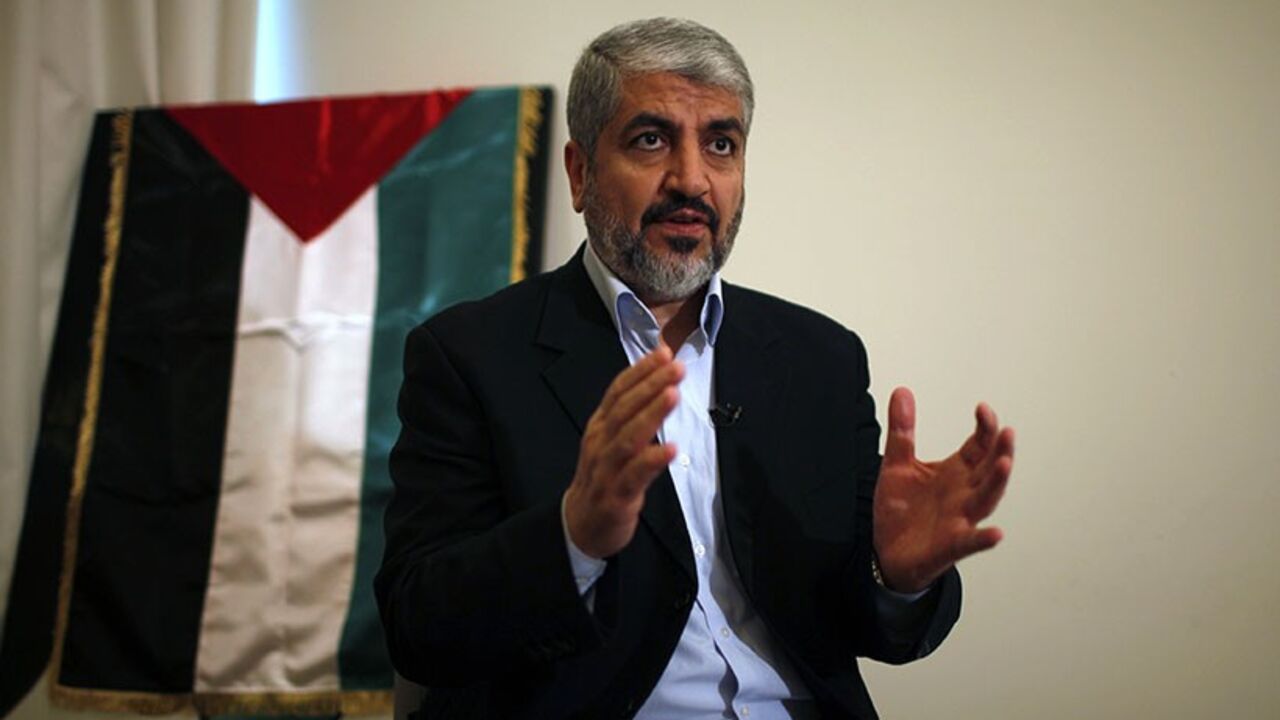Hamas leader Khaled Meshaal speaks during his interview with Reuters in Doha November 29, 2012. Meshaal said the de facto recognition of a sovereign Palestinian state won by his rival Mahmoud Abbas should be seen alongside Gaza's latest conflict with Israel as a single, bold strategy that could empower all Palestinians. Meshaal said the short war which claimed 162 Palestinian lives and five Israelis was concluded on terms set by the Palestinian Islamist movement and ended its isolation, creating a new mood 