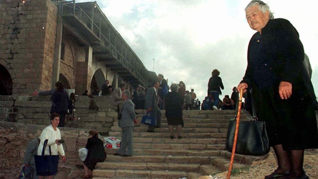 Greek Cypriot pilgrims gather outside St. Apostol Andreas monastery on the Karpas peninsula in northern Cyprus, November 30. More than one thousand Greek Cypriots today visited the monastery in the Turkish part of island to attend the annual pilgrimage. Nearly 500 Greek Cypriots had visited the monastery for first time in 23 years in August this year.

CYPRUS PILGRIMS - RTR964H