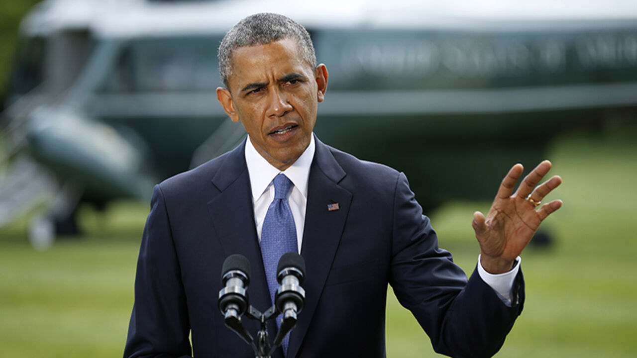 U.S. President Barack Obama speaks about the situation in Iraq from the South Lawn of the White House in Washington June 13, 2014. Obama said on Friday he will take several days to review options for how the United States can help Iraq deal with a militant insurgency, saying any action would need significant involvement by Iraq itself. REUTERS/Kevin Lamarque (UNTIED STATES - Tags: POLITICS) - RTR3TNFS