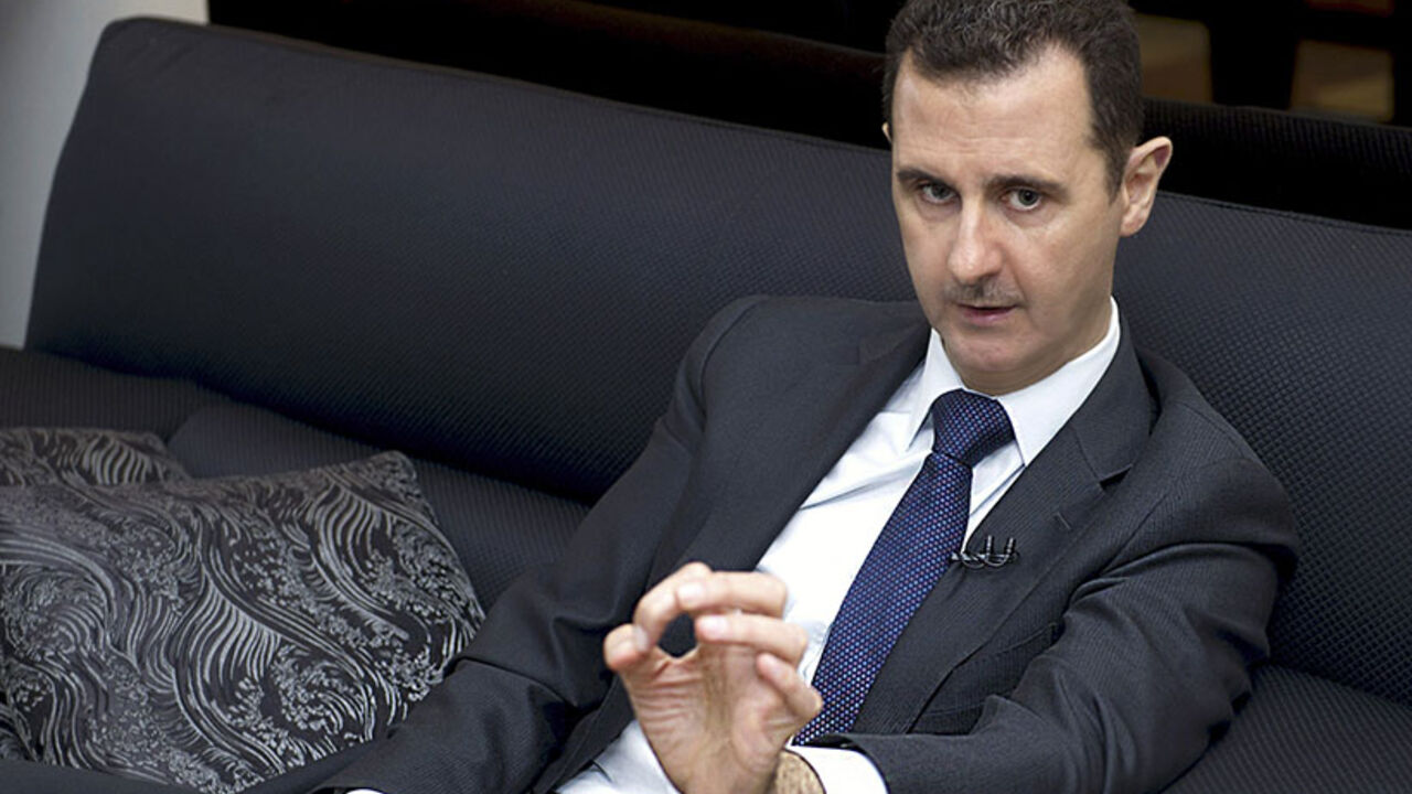 Syria's President Bashar al-Assad speaks during an interview with a German newspaper in Damascus, in this handout photograph distributed by Syria's national news agency SANA, June 17, 2013 . Europe will "pay the price" if it delivers arms to rebel forces in Syria, Assad said. REUTERS/SANA/Handout via Reuters (SYRIA - Tags: POLITICS CONFLICT) ATTENTION EDITORS - THIS IMAGE WAS PROVIDED BY A THIRD PARTY. FOR EDITORIAL USE ONLY. NOT FOR SALE FOR MARKETING OR ADVERTISING CAMPAIGNS. THIS PICTURE IS DISTRIBUTED E