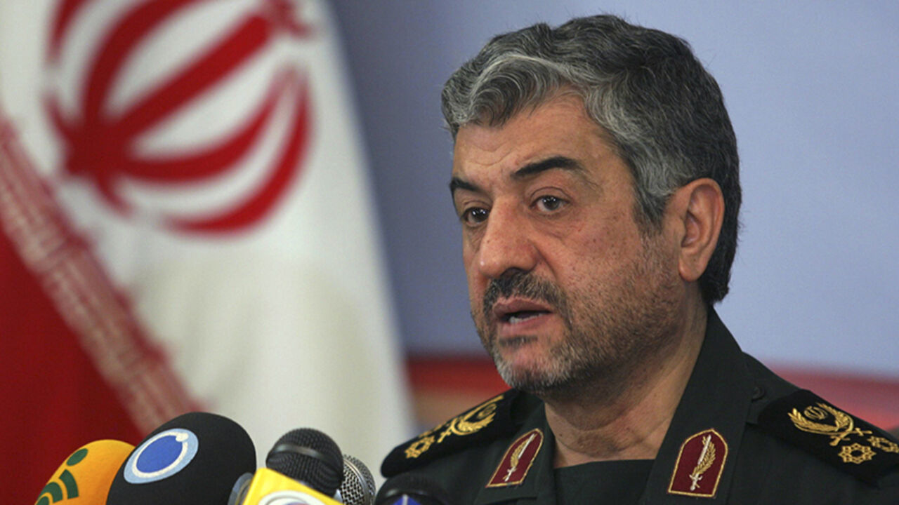 EDITORS' NOTE: Reuters and other foreign media are subject to Iranian restrictions on their ability to film or take pictures in Tehran.

Mohammad Ali Jafari, commander of the Islamic Revolutionary Guard Corp, attends a news conference in Tehran February 7, 2011. REUTERS/STRINGER (IRAN - Tags: POLITICS MILITARY) - RTXXKFA