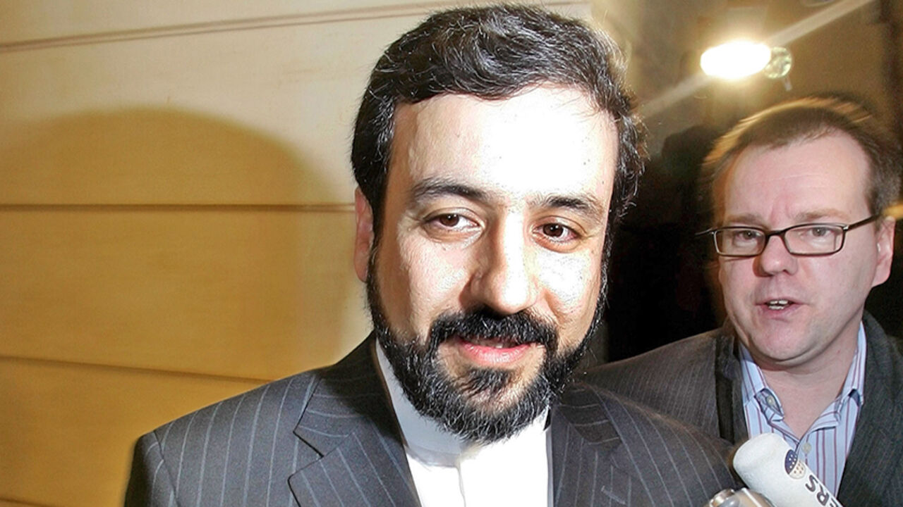 Iran's deputy Foreign Minister Abbas Araghchi leaves the Conference on Security Policy in Munich February 4, 2006. The U.N. nuclear watchdog's board of governors voted on Saturday to report Iran to the U.N. Security Council over concerns Tehran is secretly seeking atomic weapons, a diplomat said.  REUTERS/Michael Dalder - RTR15UJ5