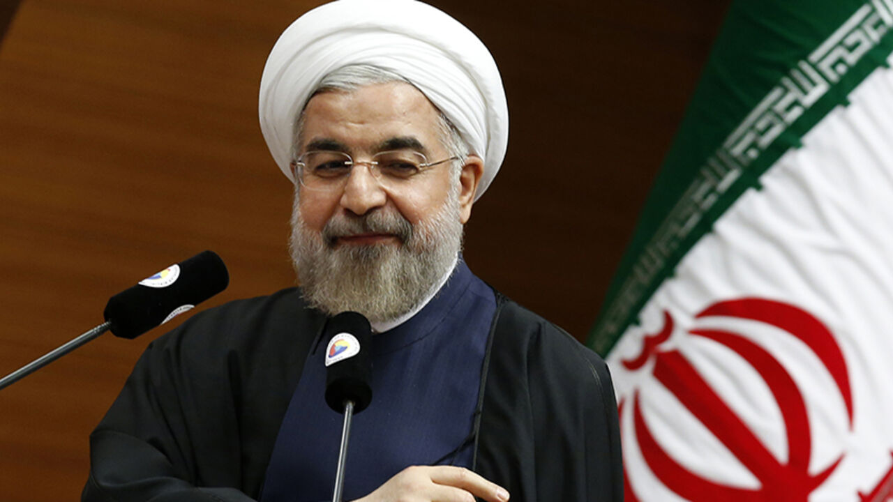 Iran's President Hassan Rouhani addresses the audience during a meeting in Ankara June 10, 2014. REUTERS/Umit Bektas (TURKEY - Tags: POLITICS) - RTR3T16B