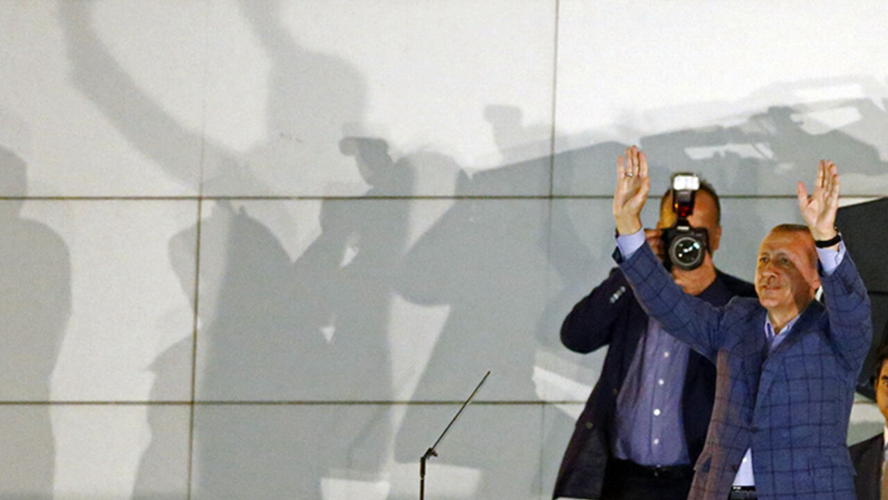 Turkey's Prime Minister Tayyip Erdogan gestures as he celebrates his election victory in front of the party headquarters in Ankara August 10, 2014. Erdogan secured his place in history as Turkey's first directly elected president on Sunday, sweeping more than half the vote in a result his opponents fear heralds an increasingly authoritarian state. REUTERS/Murad Sezer (TURKEY  - Tags: POLITICS ELECTIONS)   - RTR41W60
