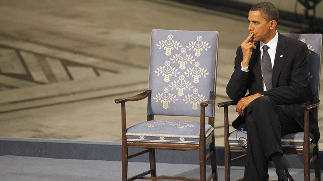 Nobel Peace Prize laureate U.S. President Barack Obama listens to a performance during the Nobel Peace Prize award ceremony at Oslo City Hall December 10, 2009. The Nobel committee is awarding the peace prize to Obama for "his extraordinary efforts to strengthen international diplomacy and cooperation between peoples" and cited his push for nuclear disarmament.  REUTERS/Thomas Peter (NORWAY) - RTXRP1N