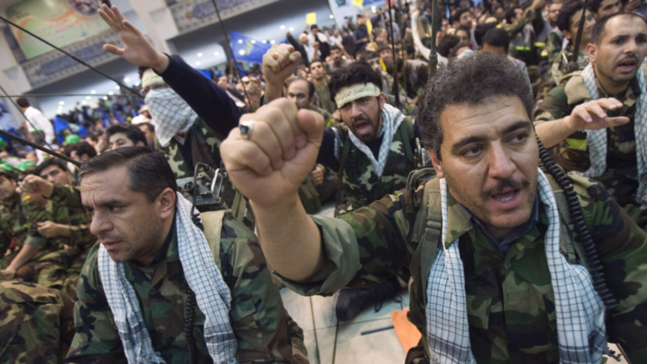 EDITORS' NOTE: Reuters and other foreign media are subject to Iranian restrictions on leaving the office to report, film or take pictures in Tehran.

Members of Iran's Islamic Basij militia shout anti-U.S. and anti-Israel slogans during a ceremony to mark Basij week in Tehran November 26, 2009. REUTERS/Morteza Nikoubazl (IRAN MILITARY POLITICS) - RTXR603