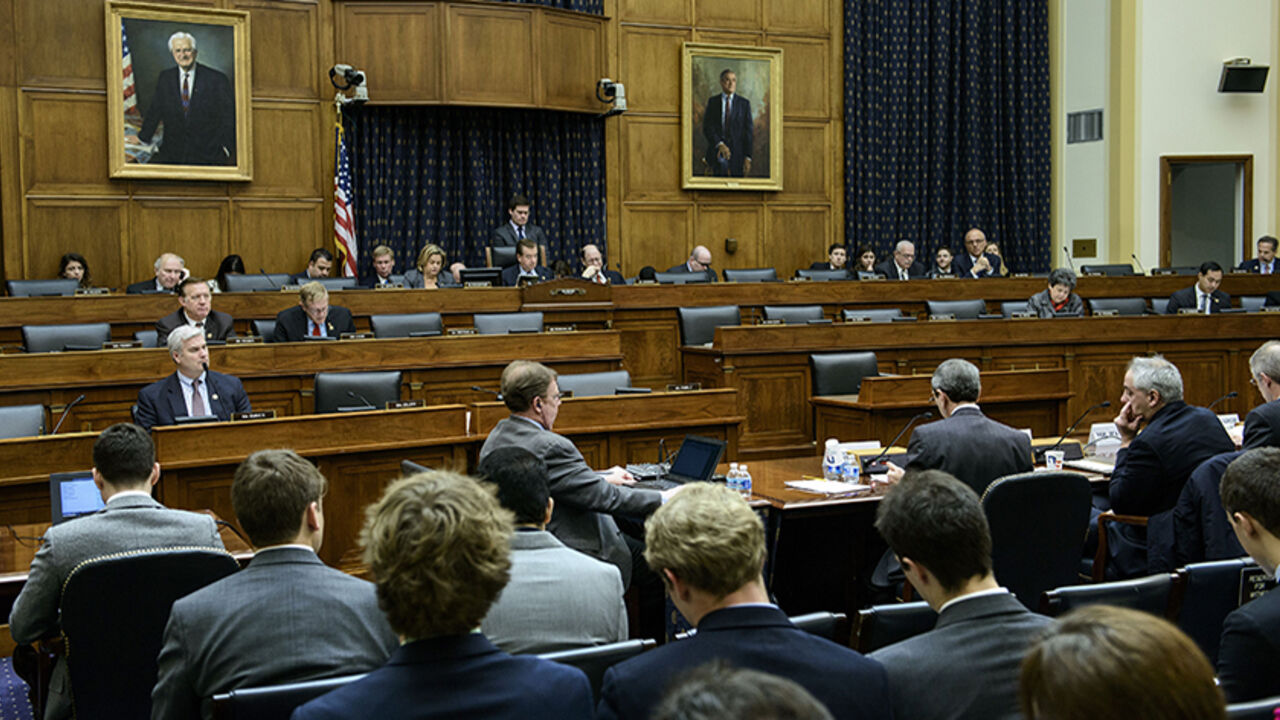 People listen during a hearing of the House Foreign Affairs Committee January 27, 2015 in Washington, DC.  The committee held the hearing on negotiations with Iran on their nuclear program. AFP PHOTO/BRENDAN SMIALOWSKI        (Photo credit should read BRENDAN SMIALOWSKI/AFP/Getty Images)