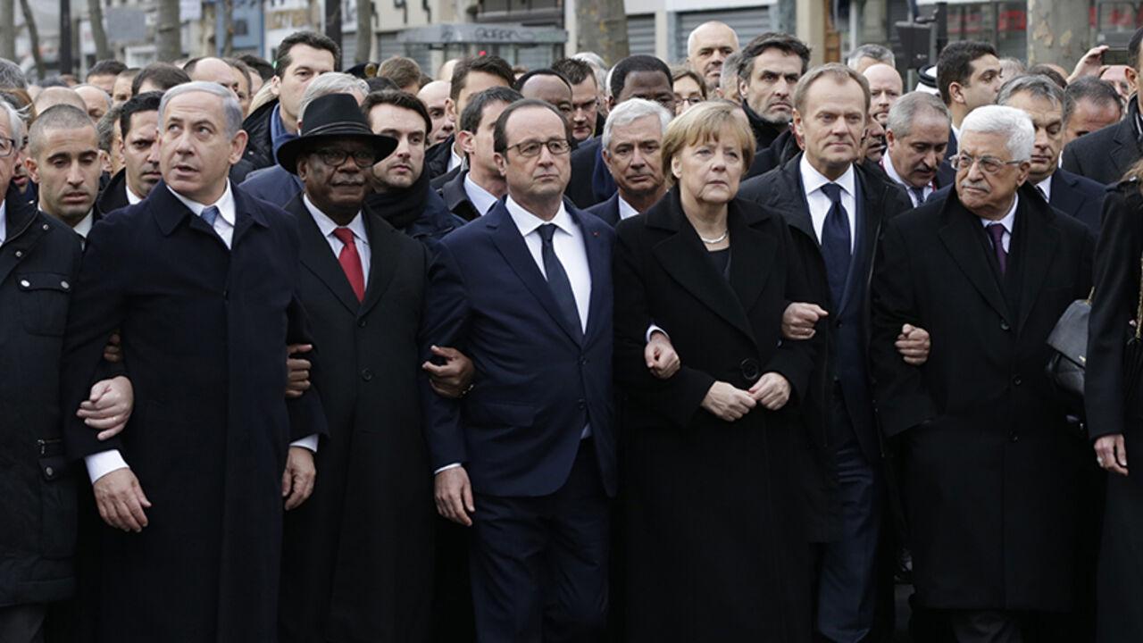 French President Francois Hollande is surrounded by Heads of state including (LtoR) Israel's Prime Minister Benjamin Netanyahu, Mali's President Ibrahim Boubacar Keita, Germany's Chancellor Angela Merkel, European Council President Donald Tusk and Palestinian President Mahmoud Abbas as they attend the solidarity march (Marche Republicaine) in the streets of Paris January 11, 2015. French citizens will be joined by dozens of foreign leaders, among them Arab and Muslim representatives, in a march on Sunday in