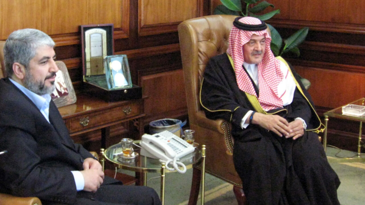 Hamas's exiled leader Khaled Meshaal (L) holds a joint press conference with Saudi Foreign Minister Prince Saud al-Faisal following a meeting in Riyadh on Januray 3, 2010. Meshaal said that the Egyptian-led talks aimed at reconciling the Palestinian Islamist movement and its rival Fatah were close to bearing fruit. AFP PHOTO/PAUL HANDLEY (Photo credit should read PAUL HANDLEY/AFP/Getty Images)