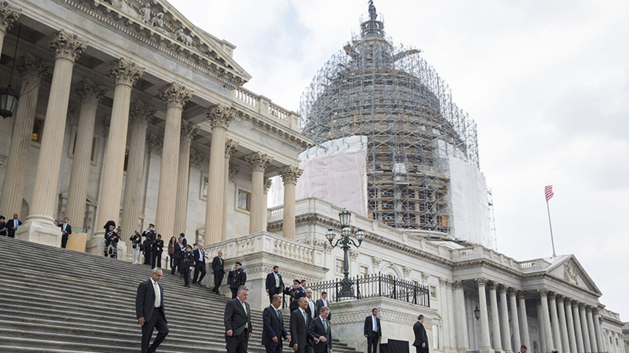 Representative Steve King (R-NY), Speaker of the House John Boehner (R-OH), U.S. President Barack Obama and Irish Taoiseach Enda Kenny walk down the step of the House of Representatives after having lunch to celebrate St. Patrick's Day on Capitol Hill in Washington on March 17, 2015.      REUTERS/Joshua Roberts    (UNITED STATES - Tags: POLITICS ANNIVERSARY) - RTR4TQH7