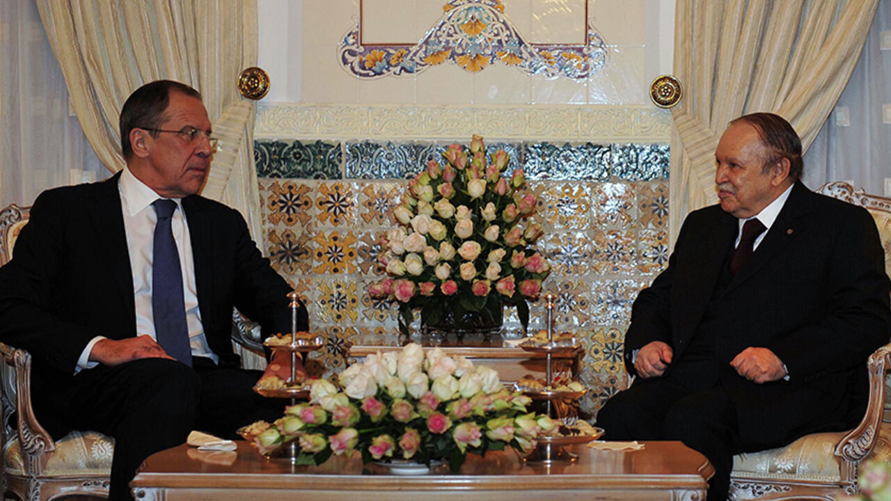 Algeria's President Abdelaziz Bouteflika (R) meets Russia's Foreign Minister Sergei Lavrov at the presidential palace in Algiers February 11, 2013. REUTERS/Stringer (ALGERIA - Tags: POLITICS) - RTR3DNG9