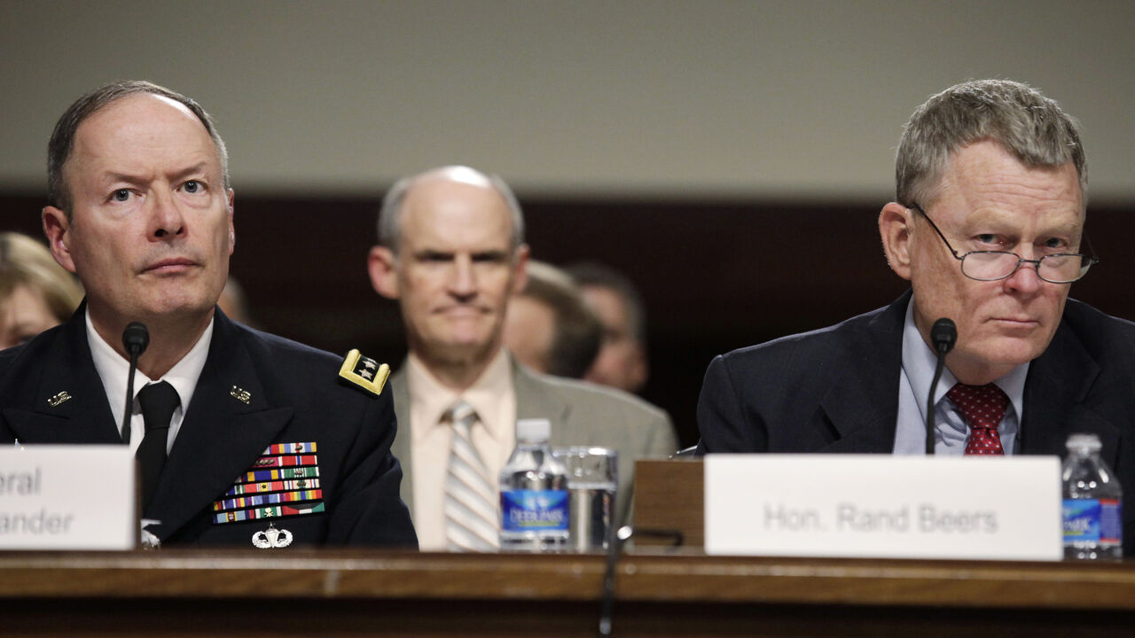 General Keith Alexander (L), commander of the U.S. Cyber Command, director of the National Security Agency (NSA) and chief of the Central Security Service (CSS), and Rand Beers, acting deputy secretary of the Department of Homeland Security, testify before the Senate Appropriations Committee hearing on Cybersecurity: Preparing for and Responding to the Enduring Threat, on Capitol Hill in Washington June 12, 2013. REUTERS/Yuri Gripas (UNITED STATES - Tags: POLITICS MILITARY SCIENCE TECHNOLOGY) - RTX10LGS