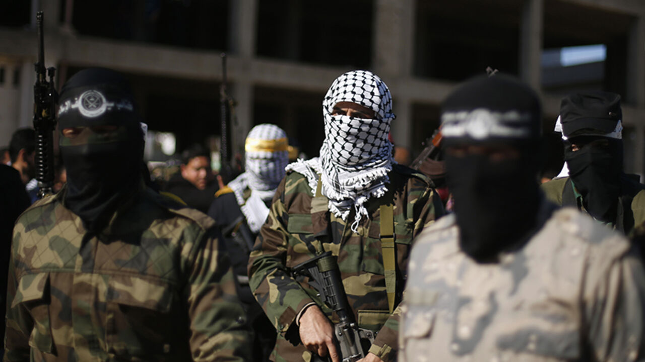 Representatives of various Palestinian armed factions leave after holding a news conference to condemn the decision of an Egyptian court that banned Hamas' armed wing, in Gaza City February 5, 2015. An Egyptian court last week banned Hamas' armed wing and listed it as a terrorist organization, prompting Hamas to reject Egypt as a mediator between Israel and the Palestinians, a role it has played for decades. 
REUTERS/Suhaib Salem (GAZA - Tags: POLITICS MILITARY CIVIL UNREST) - RTR4OC8D