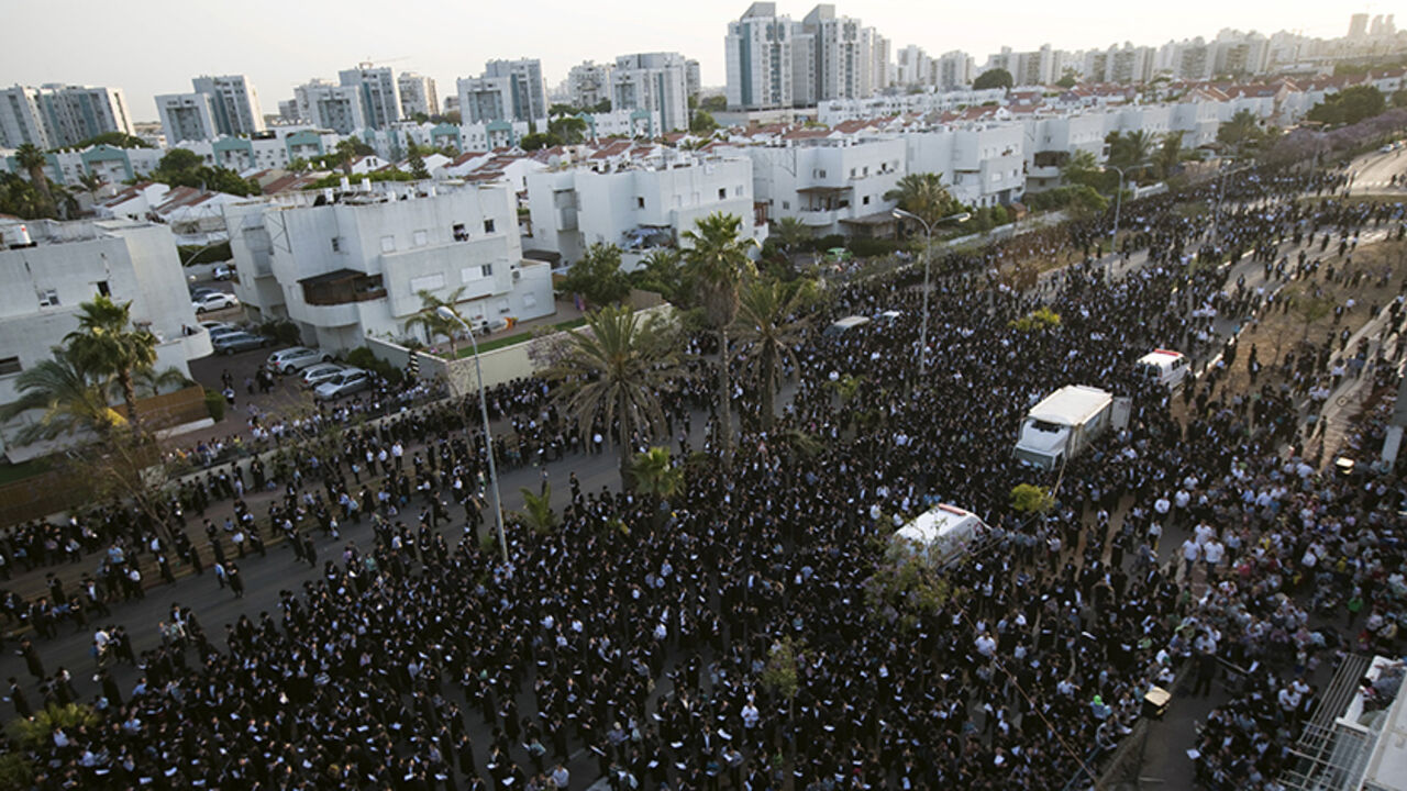Ultra-Orthodox Jews take part in a protest against a shopping centre, which opens on Saturdays, near their neighbourhood, in the southern city of Ashdod May 18, 2015. About 10,000 protesters took part in the protest. REUTERS/Amir Cohen
 - RTX1DJBK