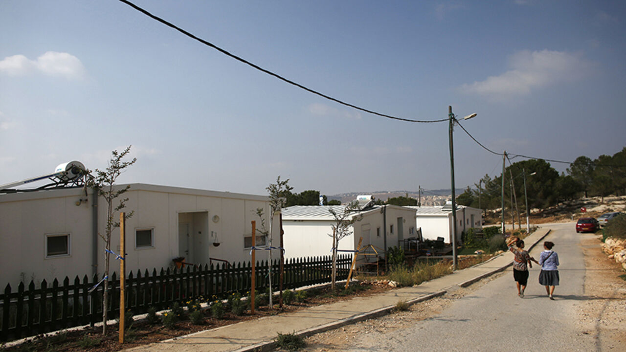 Israeli women walk in a Jewish settlement known as "Gevaot", in the Etzion settlement bloc, near Bethlehem August 31, 2014. Israel announced on Sunday a land appropriation in the occupied West Bank that an anti-settlement group termed the biggest in 30 years and a Palestinian official said would cause only more friction after the Gaza war. Some 400 hectares (988 acres) in the Etzion settlement bloc near Bethlehem were declared "state land, on the instructions of the political echelon" by the military-run Ci