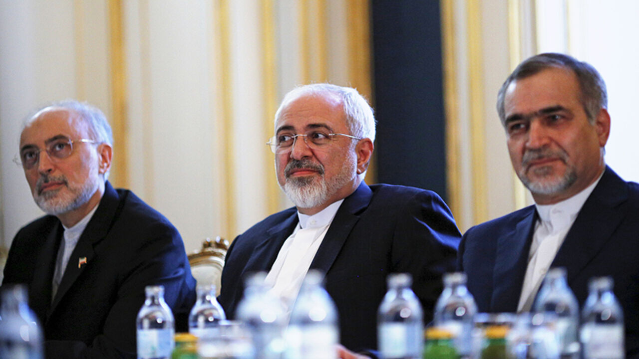 Iranian Foreign Minister Mohammad Javad Zarif (C), Head of the Iranian Atomic Energy Organization Ali Akbar Salehi and Hossein Fereydoon (R), brother and close aide to President Hassan Rouhani meet with U.S. Secretary of State John Kerry (not pictured) at a hotel in Vienna, Austria July 3, 2015. A year and half of nuclear talks between Iran and major powers were creeping towards the finish line on Friday as negotiators wrestled with sticking points including questions about Tehran's past atomic research.  R