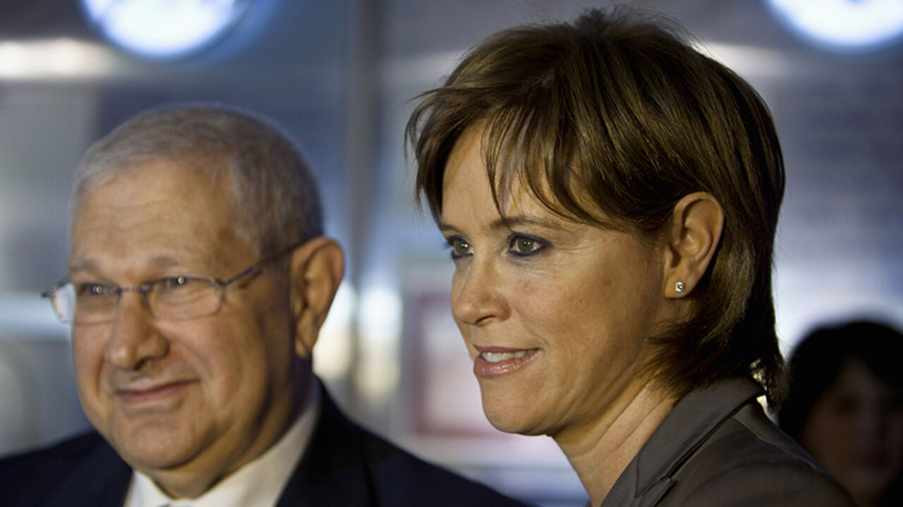 Bank Leumi's new CEO Rakefet Russak-Aminoach (R) attends a ceremony to open trading at the Tel Aviv Stock Exchange February 13, 2012. Leumi, Israel's largest bank in terms of assets, named Russak-Aminoach as its new chief executive officer, a month after the bank's veteran head Galia Maor announced plans to resign. The appointment of Russak-Aminoach, 46, a senior deputy to Maor for the past eight years, is subject to regulatory approval and when confirmed would take effect once Maor steps down in May. REUTE