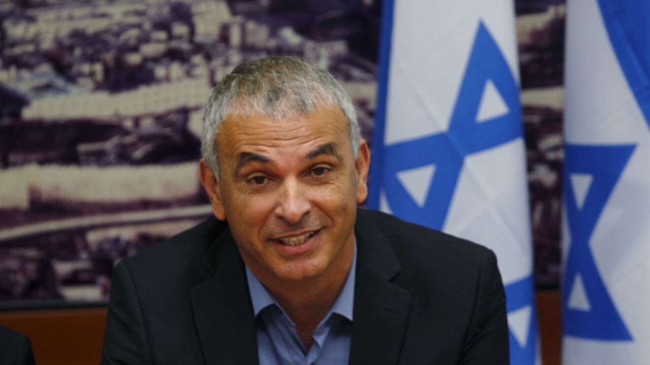 Moshe Kahlon, Israel's new Finance Minister, attends a meeting at the Finance Ministry in Jerusalem May 18, 2015. Boosting competition in Israel's banking system and the economy as a whole as well as bringing down property prices will be priorities for the country's new finance minister, he said on Monday. REUTERS/Ronen Zvulun  - RTX1DH88