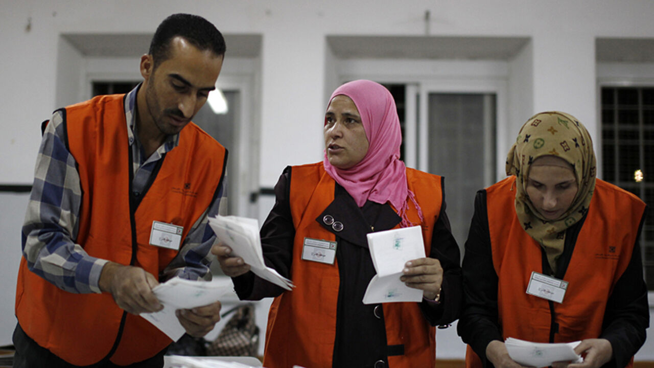 Election officials count ballots after the polls closed for municipal elections at a polling station in the West Bank city of Hebron October 20, 2012. Palestinians voted in local elections in the Israel-occupied West Bank on Saturday, their first vote for six years and one with little choice, out of step with democratic revolutions elsewhere in the Arab world. The results were expected to largely reaffirm the Western-backed, mainly secular Fatah party, which runs a de facto government in the slivers of land