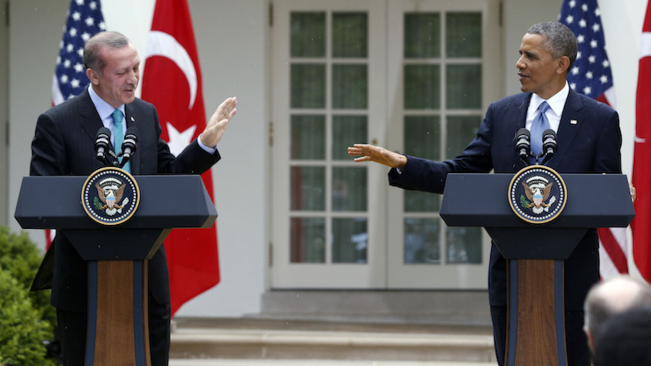 U.S. President Barack Obama (R) and Turkish Prime Minister Recep Tayyip Erdogan hold a joint news conference in the White House Rose Garden in Washington, May 16, 2013. REUTERS/Jason Reed (UNITED STATES  - Tags: POLITICS)   - RTXZPC4