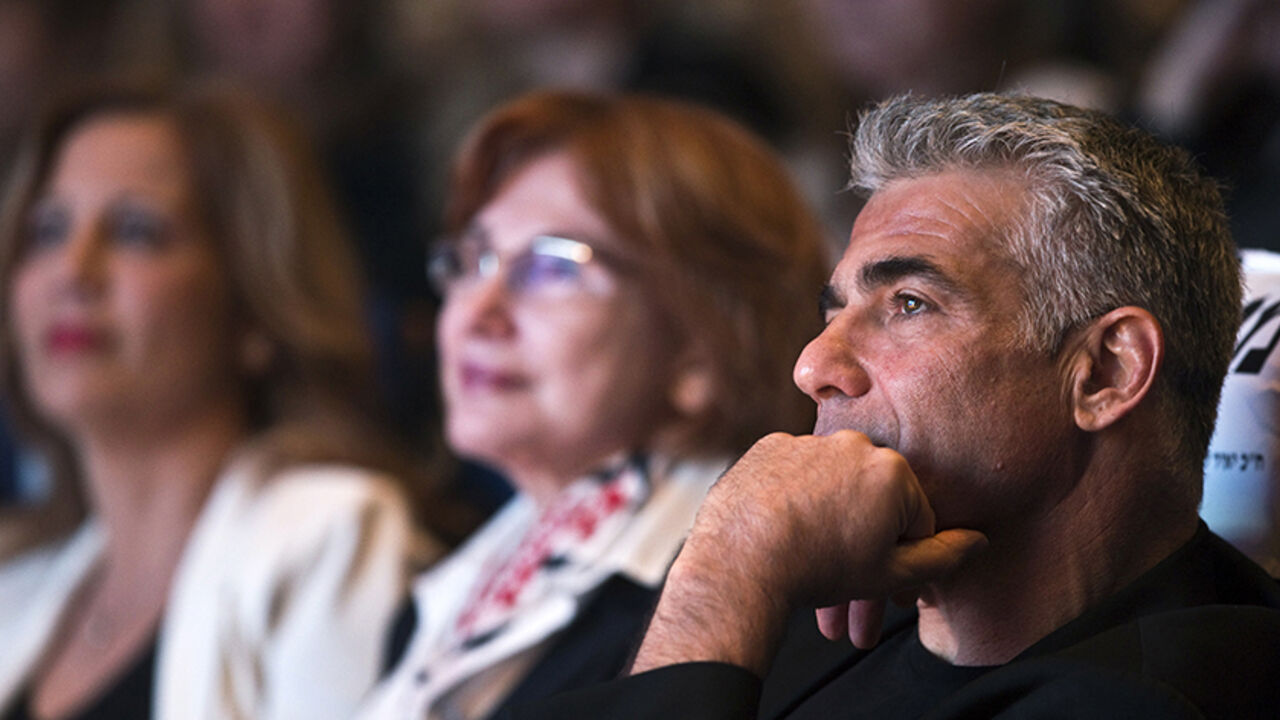 Yesh Atid leader Yair Lapid attends a women's committee convention in Tel Aviv March 1, 2015. The era of Prime Minister Benjamin Netanyahu is ending, with Israeli voters clearly more concerned about economic and social issues than about security or fears over Iran, a leading election candidate said on Monday. Lapid, a telegenic former news anchor and TV host, leads the centrist, secular Yesh Atid party ("There's a Future"), which emerged out of the cost-of-living protests that swept Israel in 2011. Picture 
