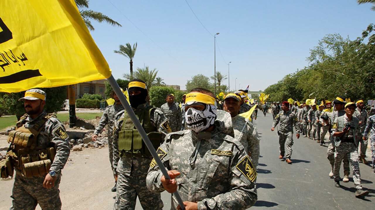 Iraqi Shi'ite Muslims from Hashid Shaabi (Popular Mobilization) march during a parade marking the annual al-Quds Day, or Jerusalem Day, during the Muslim holy month of Ramadan in Baghdad, Iraq July 1, 2016. REUTERS/Khalid al Mousily - RTX2J7WT