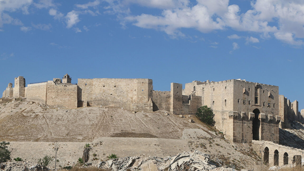 A general view shows Aleppo's historic citadel, controlled by forces loyal to Syria's President Bashar al-Assad, as seen from a rebel-held area of Aleppo, Syria July 5, 2016. REUTERS/Abdalrhman Ismail  - RTX2JVC1