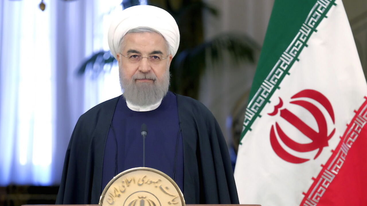 Iranian President Hassan Rouhani attend a news conference with Swiss President Johann Schneider-Ammann in Tehran February 27, 2016.REUTERS/Raheb Homavandi/TIMA  ATTENTION EDITORS - THIS IMAGE WAS PROVIDED BY A THIRD PARTY. FOR EDITORIAL USE ONLY. - RTS88J7