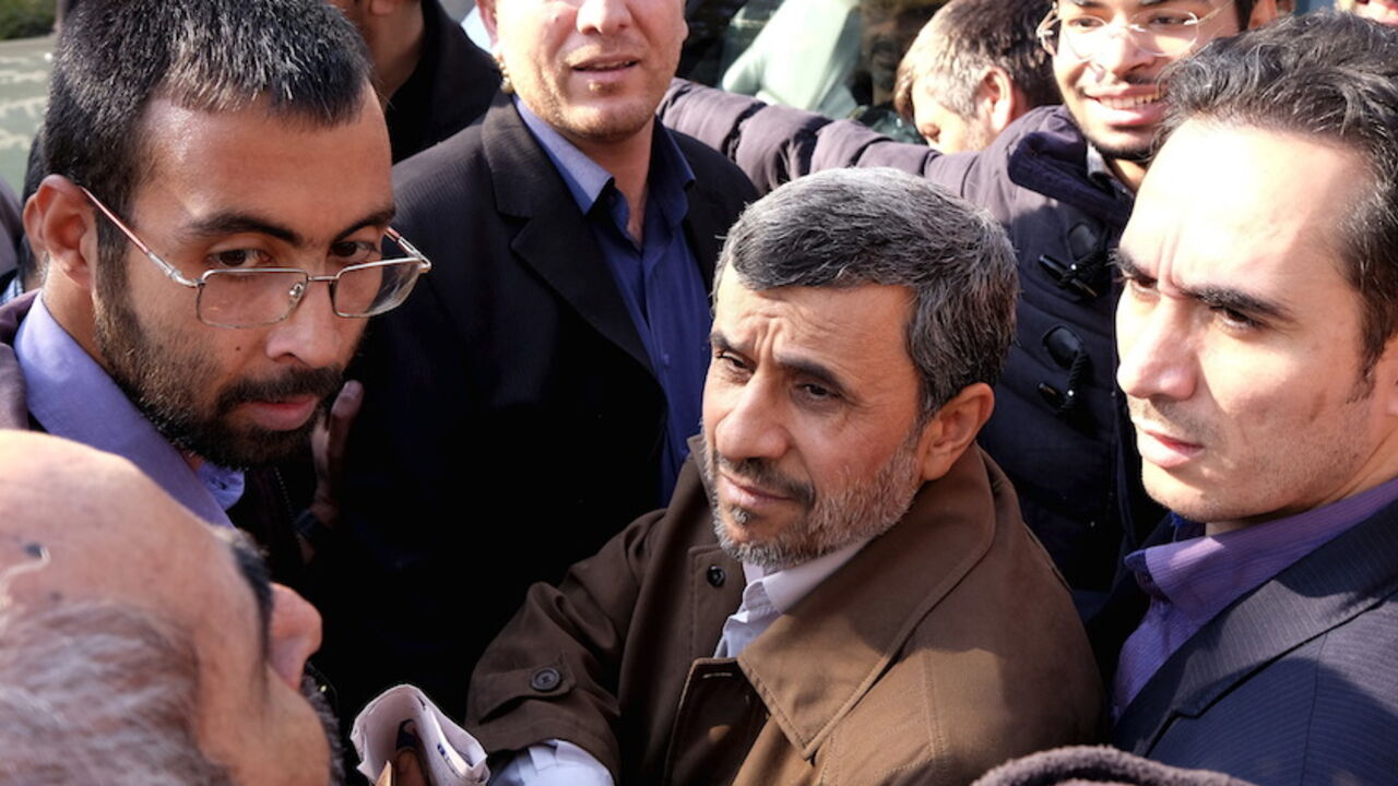 Former Iranian President Mahmoud Ahmadinejad (C front) listens to his supporters during the funeral ceremony of Iran's Ambassador to Lebanon Ghazanfar Roknabadi, who was killed in Saudi Arabia in a stampede at the haj pilgrimage, after Friday prayer in Tehran November 27, 2015. REUTERS/Raheb Homavandi/TIMA  ATTENTION EDITORS - THIS IMAGE WAS PROVIDED BY A THIRD PARTY. FOR EDITORIAL USE ONLY.  - RTX1W3E5