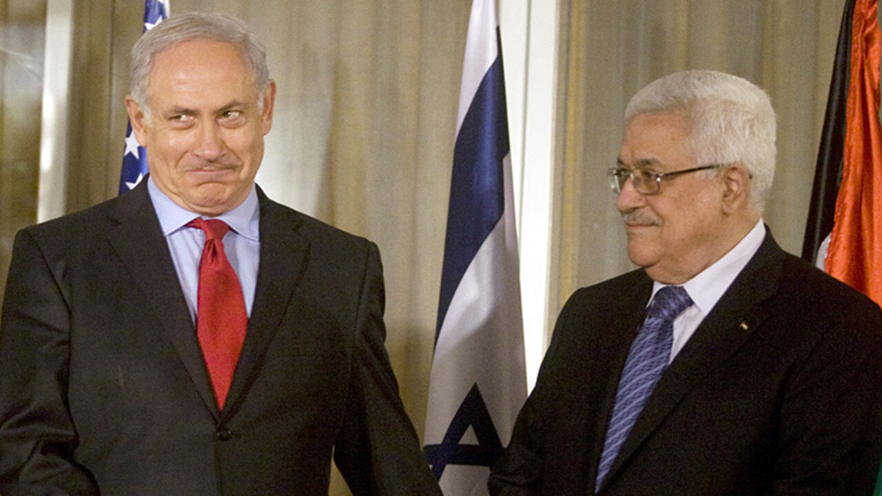 JERUSALEM, ISRAEL - SEPTEMBER 15:  (L-R) Israeli Prime Minister Benjamin Netanyahu and President of the Palestinian Authority Mahmoud Abbas meet at Netanyahu's residence September 15, 2010 in Jerusalem, Israel. Netanyahu and Abbas are deadlocked in peace negotiations over Israeli settlement building.  (Photo by Lior Mizrahi-Pool/Getty Images)