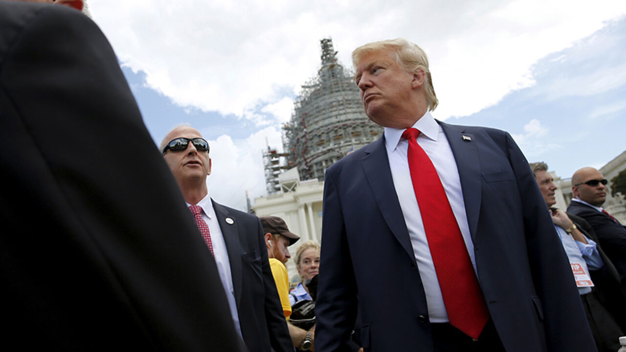 U.S. Republican presidential candidate Donald Trump arrives to address a Tea Party rally against the Iran nuclear deal at the U.S. Capitol in Washington September 9, 2015. REUTERS/Jonathan Ernst - RTSDEW
