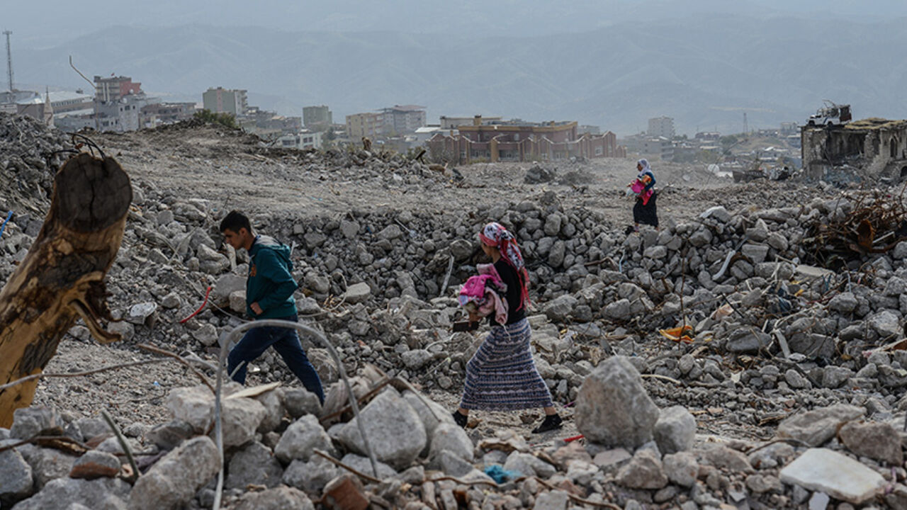 People arrive at Sirnak city on November 14, 2016  after a 246-day curfew was partially lifted. 
The curfew in Sirnak, a city of 290,000, was imposed on March 14 as part of operations to eradicate the PKK from eastern Turkey. / AFP / ILYAS AKENGIN        (Photo credit should read ILYAS AKENGIN/AFP/Getty Images)