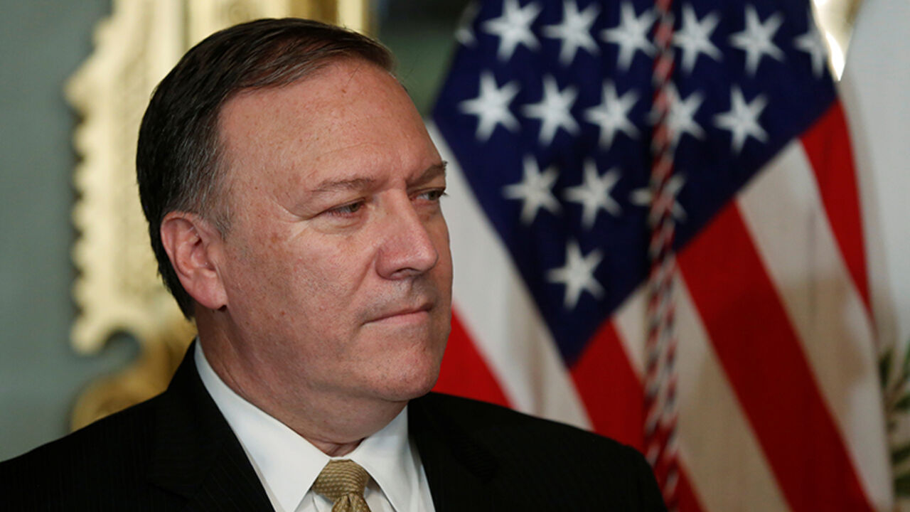 Mike Pompeo waits to be sworn in as director of the Central Intelligence Agency (CIA) in U.S. Vice President Mike Pence's ceremonial office in the Eisenhower Executive Office Building at the White House in Washington, U.S. January 23, 2017.  REUTERS/Jonathan Ernst - RTSX1LZ
