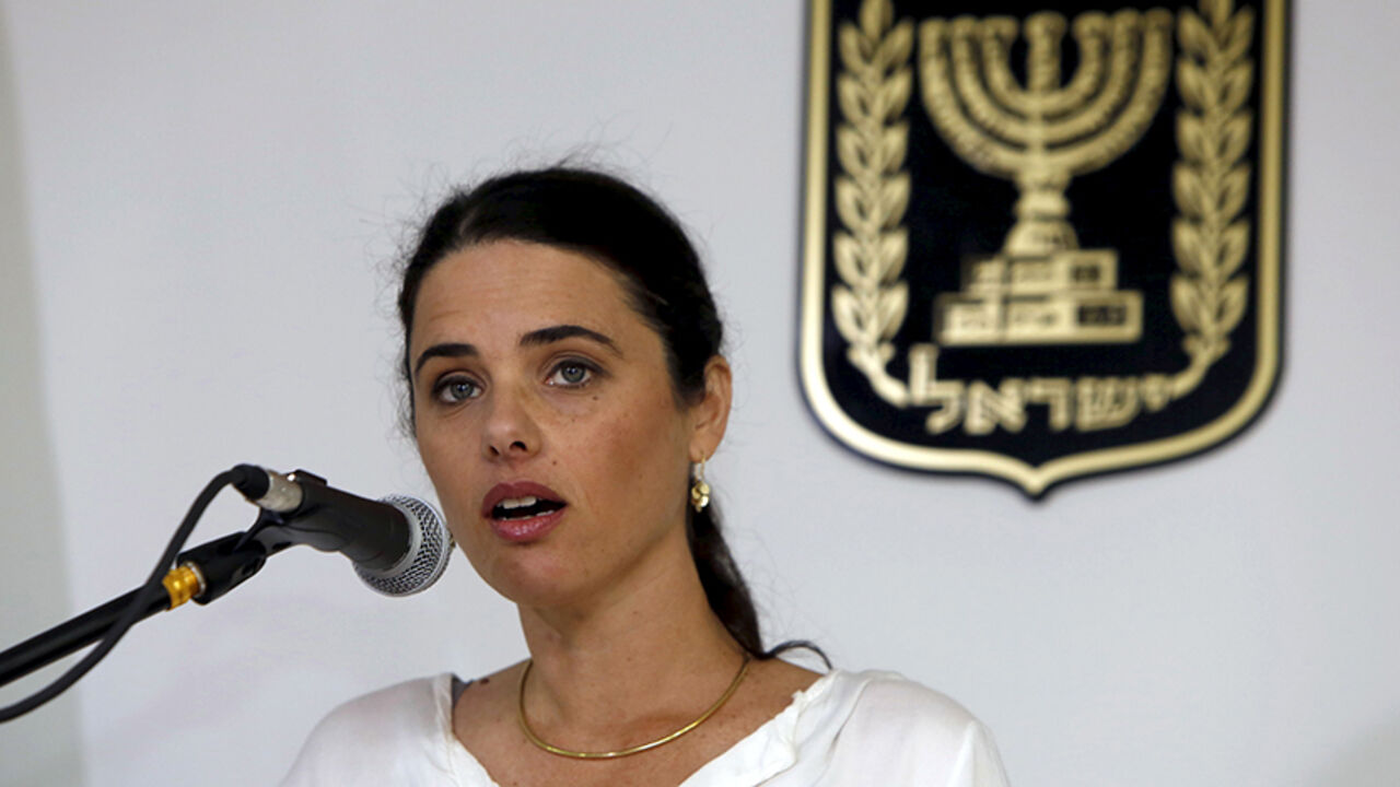 Ayelet Shaked, Israel's new Justice Minister of the far-right Jewish Home party, speaks during a ceremony at the Justice Ministry in Jerusalem May 17, 2015. Shaked said on Sunday she would seek a new balance that would rein in the powers of the Supreme Court over parliament and the government, a policy critics fear would restrict judicial oversight. REUTERS/Gali Tibbon/Pool - RTX1DBE4