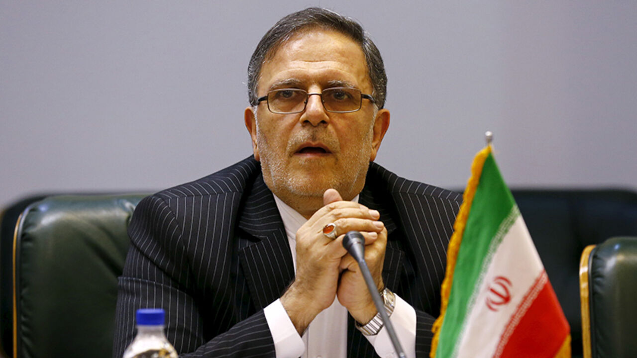 Valiollah Seif, Governor of Central Bank of Iran, waits to start a meeting with Britain's Foreign Secretary Philip Hammond (unseen) in Tehran, Iran August 23, 2015.  REUTERS/Darren Staples - RTX1PBAT
