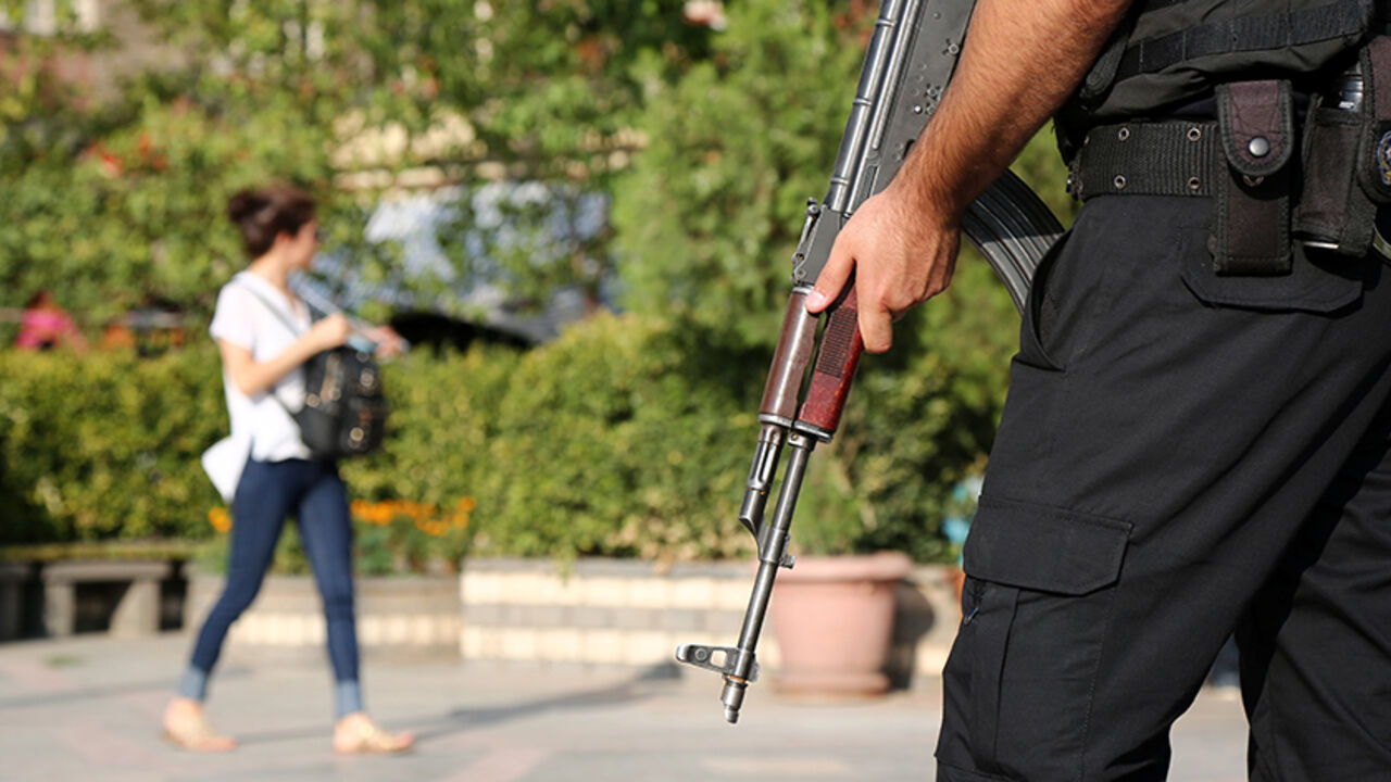 A riot police stands guard during a pro-Kurdish gathering in the southeastern city of Diyarbakir, Turkey, August 31, 2016. To match TURKEY-SECURITY/POLICE   REUTERS/Sertac Kayar - RTX2OUGW