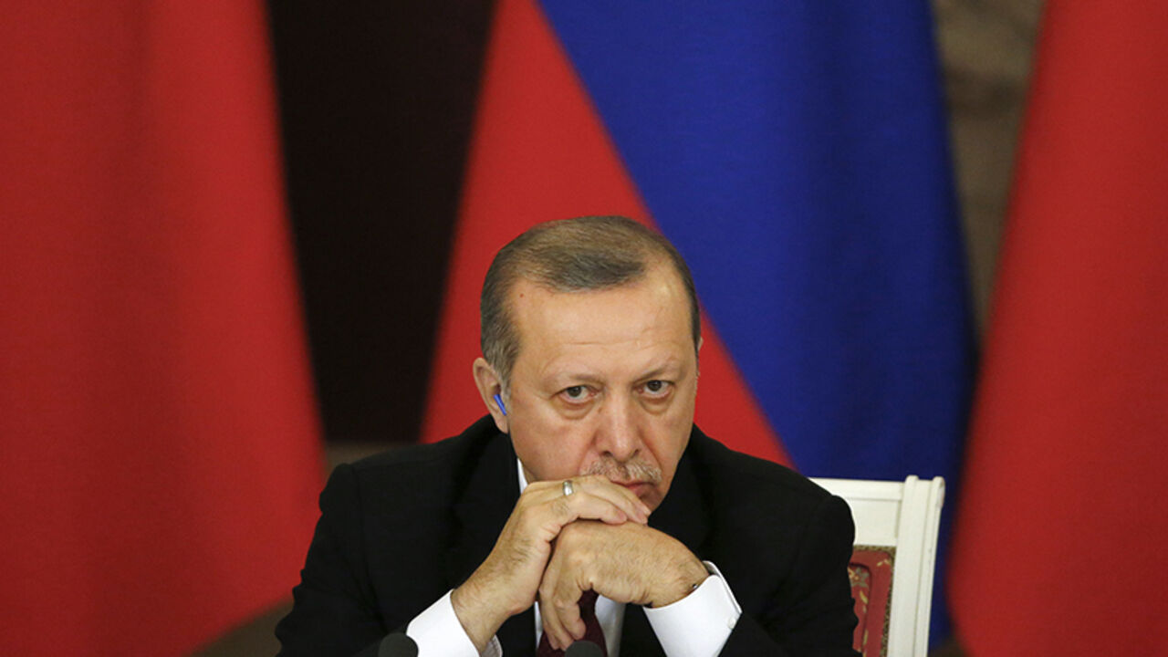 Turkish President Tayyip Erdogan attends a news conference after the talks with his Russian counterpart Vladimir Putin at the Kremlin in Moscow, Russia, March 10, 2017. REUTERS/Sergei Ilnitsky/Pool - RTS12BWW