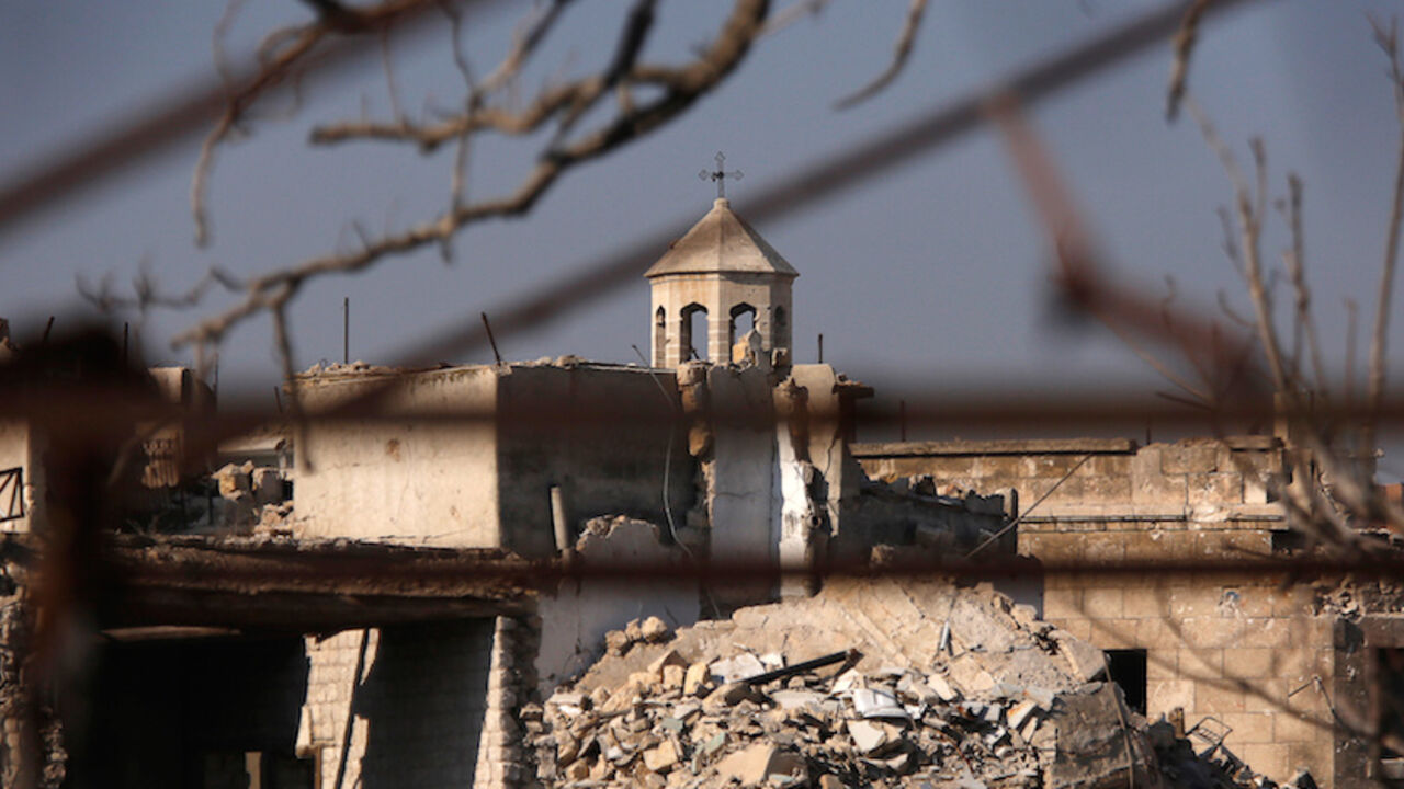 A part of a church is seen amid the damage in the government-controlled area of the Old City of Aleppo, Syria December 10, 2016. REUTERS/Omar Sanadiki - RTX2UEEY