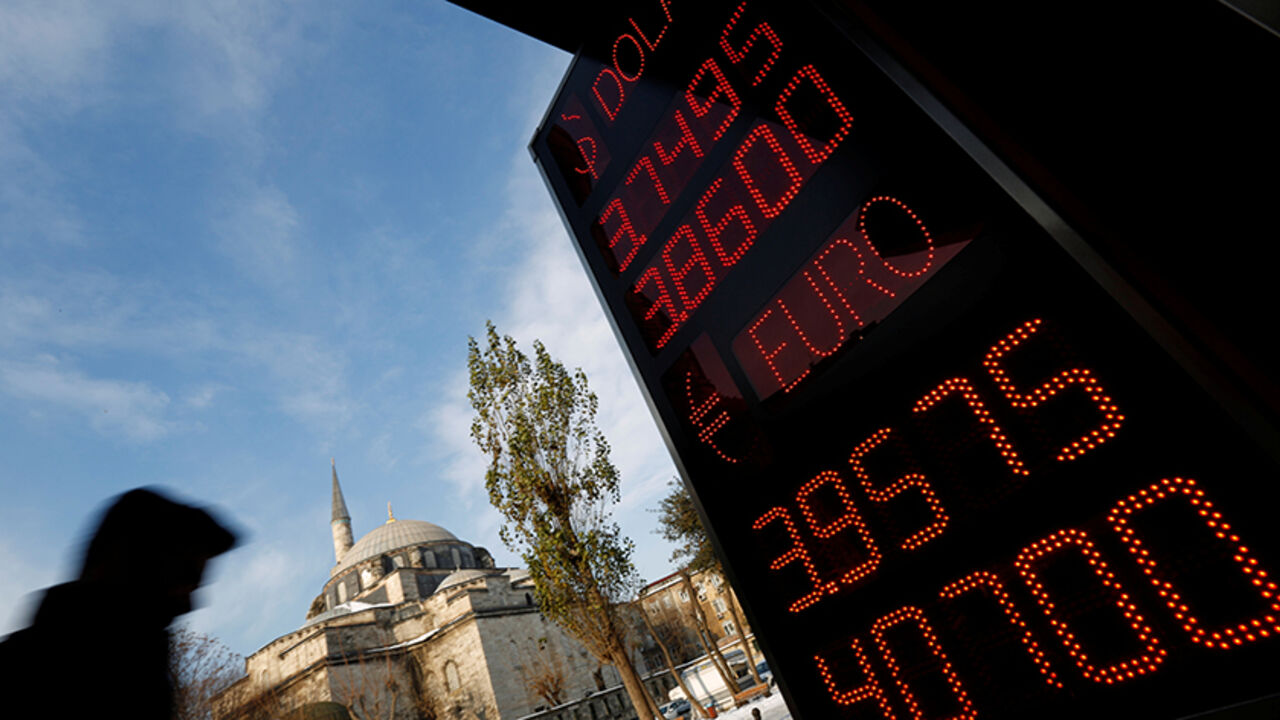 A board showing the currency exchange rates of the U.S. dollar and the Euro against Turkish lira is on display at a currency exchange office in Istanbul, Turkey, January 11, 2017. REUTERS/Murad Sezer - RTX2YFYP