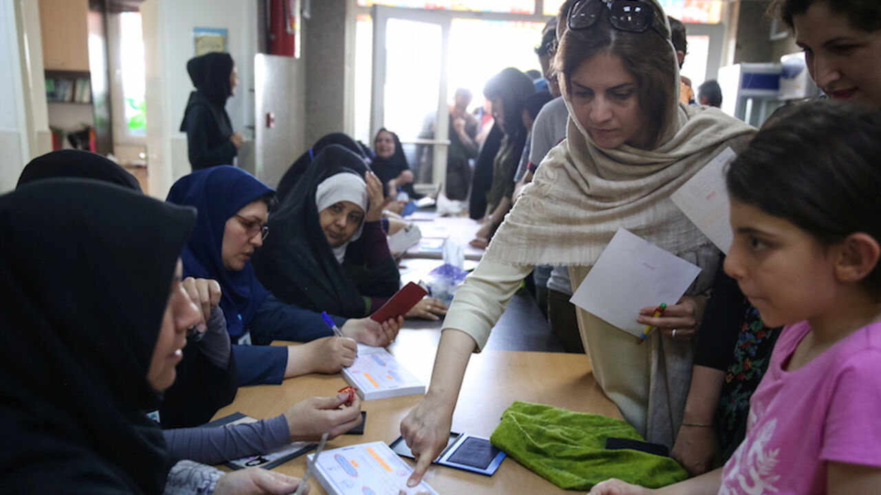 Voters cast their ballots during the presidential election in a Jewish and Christian district in the center of Tehran, Iran, May 19, 2017. TIMA via REUTERS ATTENTION EDITORS - THIS IMAGE WAS PROVIDED BY A THIRD PARTY. FOR EDITORIAL USE ONLY. - RTX36KLY