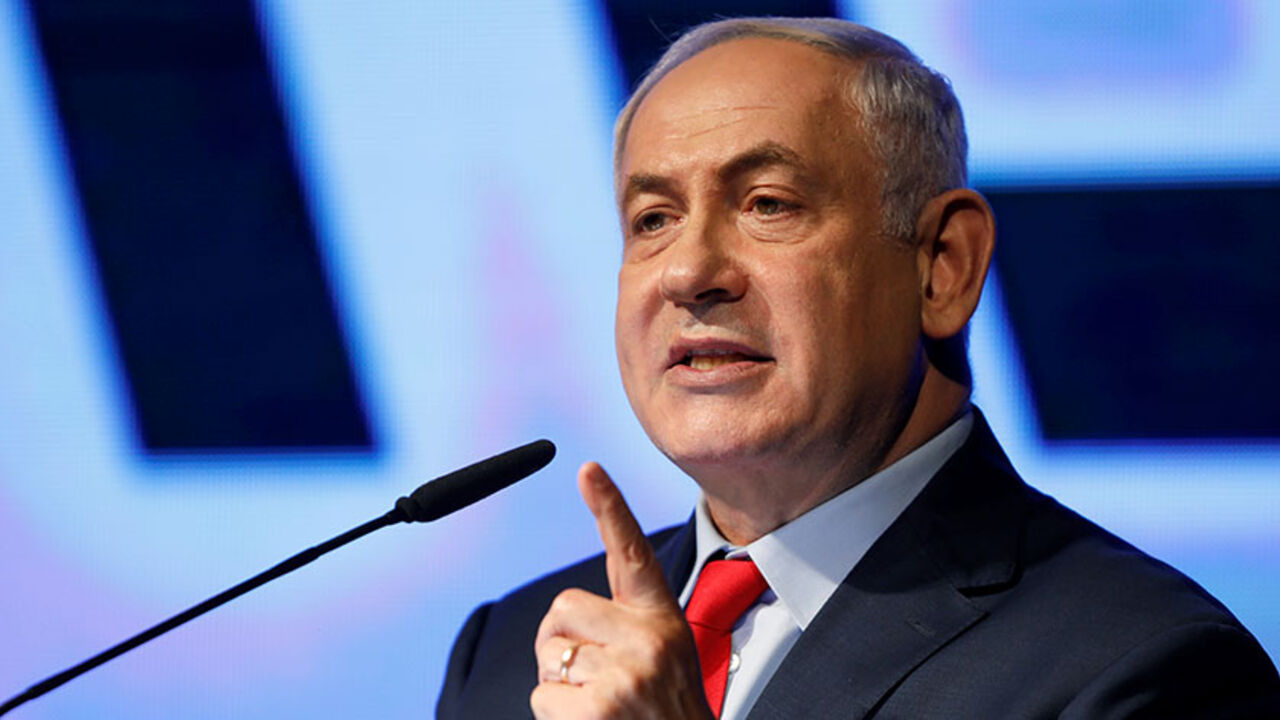 Israeli Prime minister Benjamin Netanyahu speaks during an event by his Likud Party to show support for its leader in Tel Aviv, Israel August 9, 2017. REUTERS/Amir Cohen - RTS1B3GU