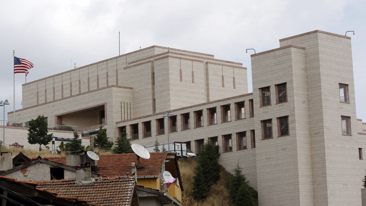A U.S. flag flutters over the U.S. Consulate in Istanbul July 9, 2008. Three policemen and three gunmen were killed in an armed attack on the United States consulate in Istanbul on Wednesday, the city's governor said.     REUTERS/Fatih Saribas (TURKEY) - GM1E4791G7S01