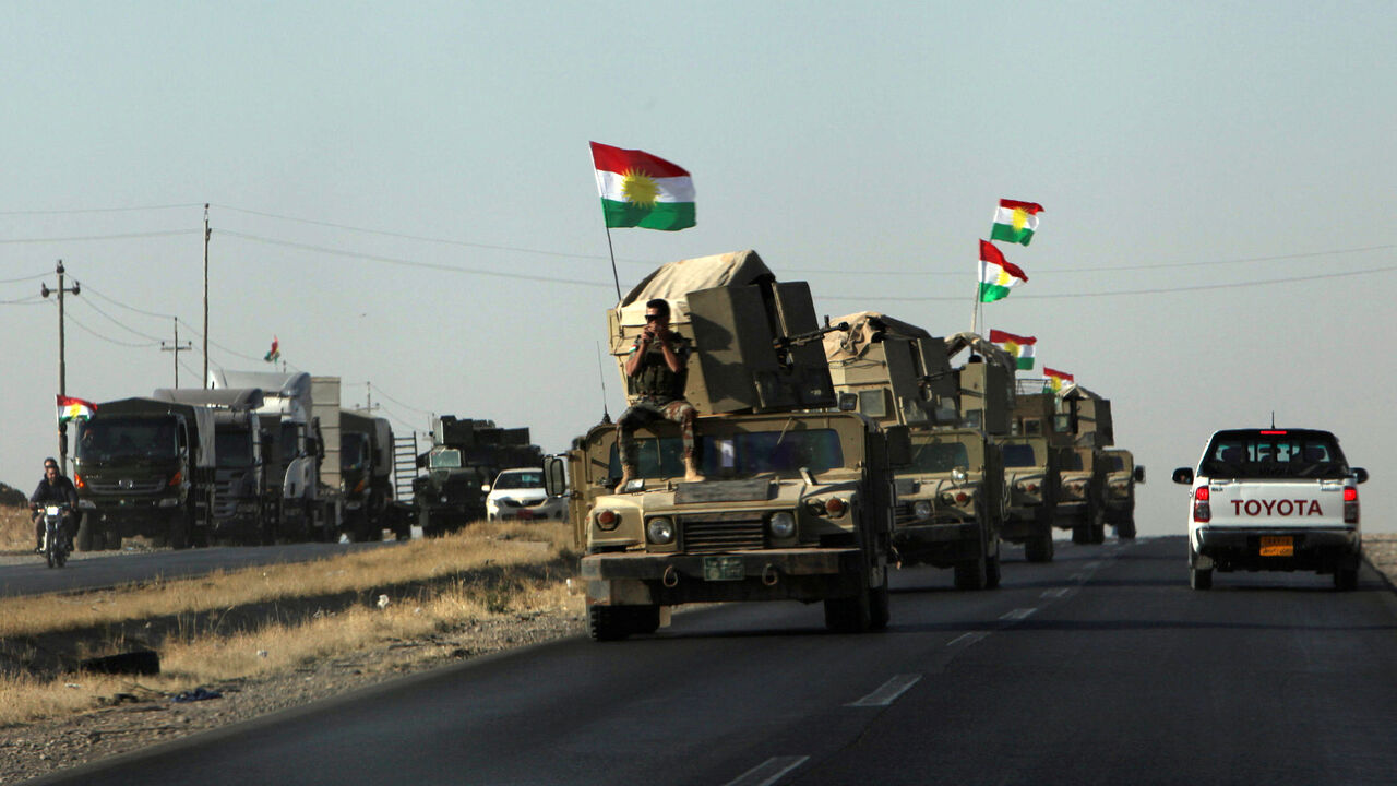 Vehicles of Kurdish Peshmarga Forces are seen near Altun Kupri between Kirkuk and Erbil, Iraq October 20, 2017. REUTERS/Azad Lashkari - RC1FFF872240