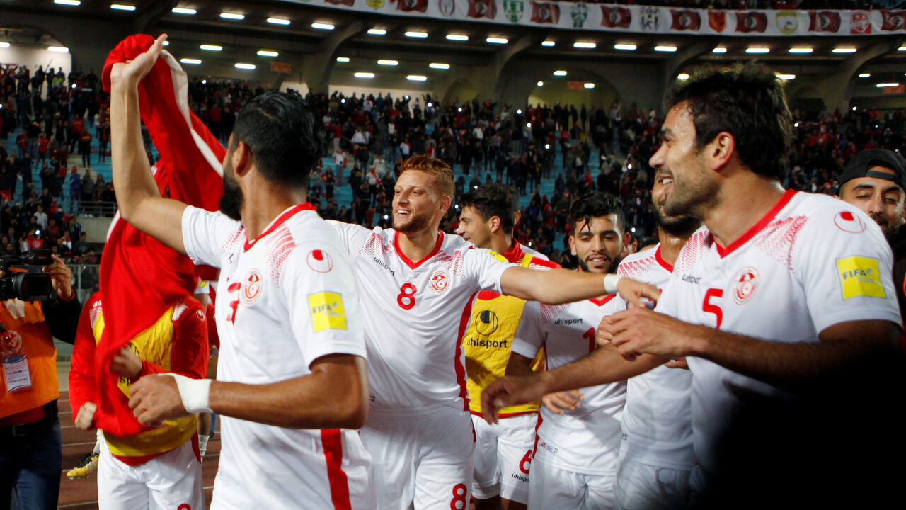 Soccer Football - 2018 World Cup Qualifications - Africa - Tunisia  vs Libya - Rades Olympic stadium - Tunis, Tunisia -  November 11, 2017 Tunisia's players celebrate qualifying for the World Cup.  REUTERS/Zoubeir Souissi - RC1AB2B62AA0