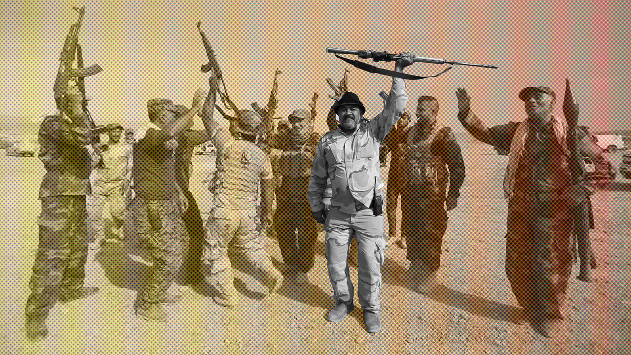 Shi'ite fighters chant slogans in al-Fatha, northeast of Baiji, October 18, 2015. Iraqi forces backed by Shi'ite militia fighters say they have retaken a mountain palace complex of former President Saddam Hussein from Islamic State fighters, as government forces push ahead on a major offensive against the insurgents.   REUTERS/Thaier Al-Sudani  - GF10000249696