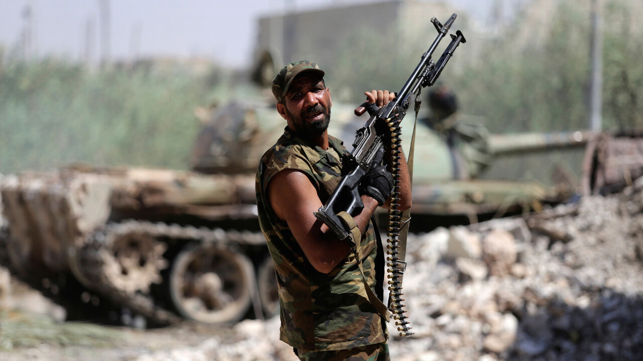 A member of the Libyan Army's special forces holds his weapon during clashes with Islamist militants in the militants' last stronghold in Benghazi, Libya, July 17, 2017. REUTERS/Esam Omran Al-Fetori - RC1A6C1E59B0
