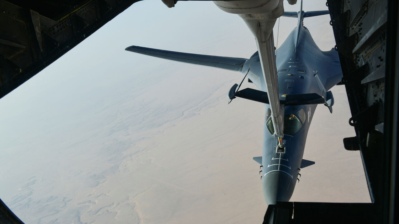 A U.S. Air Force B-1B Lancer bomber, being deployed to launch strikes as part of the multinational response to Syria's use of chemical weapons, is refuelled by a KC-135 tanker aircraft over an undisclosed location, April 14, 2018. U.S. Air Force/Handout via REUTERS. ATTENTION EDITORS - THIS IMAGE WAS PROVIDED BY A THIRD PARTY - RC1C9014E3B0