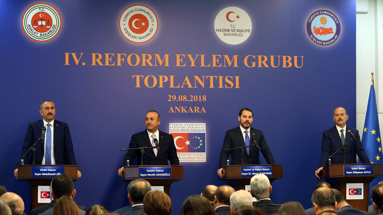 (FromL) Turkish Justice Minister Abdulhamit Gul, Turkish Foreign Minister Mevlut Cavusoglu, Treasury and Finance Minister Berat Albayrak and Turkish Interior Minister Suleyman Soylu give a press conference after a "Reform Action Group" meeting held by the Presidency of the European Union at the Ministry of Foreign Affairs in Ankara on August 29, 2018. (Photo by ADEM ALTAN / AFP)        (Photo credit should read ADEM ALTAN/AFP/Getty Images)